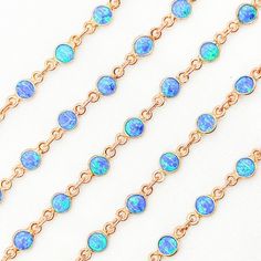 Created Blue Opal Round Shape Connected Chain HIGH QUALITY OPAL BEAD CHAIN This modern and on-trend design is crafted from Gold Plated 925 Sterling Silver  Item number: CBO8  Type of Stone: Opal Stone Size: 4mm (the sizes are approximate). Number of Stones per Foot: 26 approx. Metal: Gold Plated 925 Sterling Silver Length: sold by the foot. Choose the amount in the drop down menu Processing time: 1-2 business days FAST SHIPPING - Gold Plated 925 Sterling Silver 100% - If this chain is kinked, knotted or pulled it is easily damaged. We have many other more durable chains options available. We carry the highest quality of sterling silver, gold filled chains, various jewelry findings, supplies and charms. To view our entire collection, please visit our storefront here: https://www.etsy.com/sh Permanent Jewelry, Solid Gold Chains, White Gold Chains, Silver Chains, Diamond Quartz, Chain Silver, Diamond Charm, Bead Chain, Opal Stone