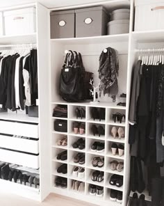 an organized closet with shoes, bags and handbags on it's shelfs