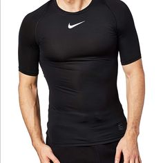 New With Tag Nike Pro Fabric Helps You Feel Locked In And Cool. Compressive Fit For A Locked-In Feel. Crew Neck Is Lower In The Front For Comfort. Mesh Fabric Under The Arms Enhances Ventilation Nike Compression Shirt Men, Nike Fitted Sports Shirt, Nike Fitted Shirt For Sports, Fitted Nike Sports Shirt, Fitted Nike Shirt For Sports, Fitted Black Shirt For Gym, Nike Short Sleeve Training Tops, Nike Fitted Sportswear T-shirt, Nike Fitted Functional Tops