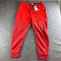 Nike Tech Fleece Pants Jogger Tapered Slim Size Xl Brand New With Tags Color: Red See Photos For Measurements Nike Track Pants Mens, Grey Nike Sweats, Nike Sweatpants Mens, Nike Pants Mens, Nike Tech Fleece Pants, White Jogger Pants, Nike Sportswear Mens, Red Joggers, Basketball Pants