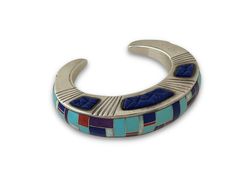 New, one of a kind Ben Nighthorse bracelet! Sterling silver inlaid with turquoise, coral lapis, sugilite and white opal. 7/8” wide, sits 3/4” high and is a size 6 1/2. Luxury Sterling Silver Inlay Bracelet As Gift, Luxury Sterling Silver Inlay Bracelet, Luxury Turquoise Bracelets With Inlay, Award Winning Jewelry, Bolo Ties, Bracelet Sterling Silver, White Opal, 50 Years, Diamond Jewelry