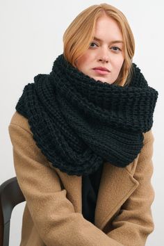 Re-introducing London: our beloved oversized chunky infinity scarf, now in ultra-soft vegan yarn. Knitted from European wool-free vegan yarn, she doesn't compromise on warmth or feel. Generously sized with a chunky knit, wrap or drape her as you please to keep you cozy and stylish whenever temperatures drop. Shop the original London in many shades of French merino wool-blend yarn here.[SPLIT] Available in one size. Laid flat, the scarf measures 29" (74 cm) x 19" (48 cm), which is half of the loo Black Scarves For Cold Weather, One Size, Chunky Knit Scarves For Cold Weather, Cozy Chunky Knit Infinity Scarf, Cozy Knit Infinity Scarf, Cozy Loop Infinity Scarf, Chunky Knit One-size Infinity Scarf, Fall Chunky Knit Infinity Scarf, Casual Chunky Knit Infinity Scarf For Fall, Soft Knit Infinity Scarf For Fall