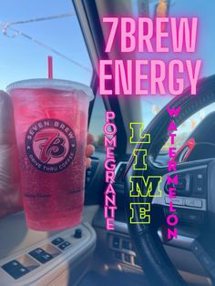 a person holding up a pink drink in their hand with the words 7brew energy on it