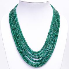 Presenting our exquisite 6 Layered Emerald Gemstone Smooth Rondelle Beads Necklace, a handcrafted masterpiece designed to enhance elegance and allure, perfect for weddings and as a bridesmaid gift. Here's why it's an impeccable choice for celebrating special occasions: Luxurious Emerald Gemstones: Each layer of this necklace is adorned with smooth rondelle beads made from genuine emerald gemstones. Renowned for their rich green hue and natural beauty, emeralds symbolize love, renewal, and growth Luxury Green Beaded Necklace For Celebration, Luxury Rondelle Emerald Necklace, Luxury Beaded Emerald Necklace, Elegant Emerald Necklace With Faceted Beads, Elegant Round Emerald Necklace With Faceted Beads, Elegant Faceted Gemstone Beads, Elegant Faceted Round Bead Gemstones, Faceted Emerald Necklaces With Round Beads, Elegant Gemstone Oval Beads