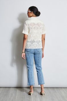 In modern lace, this shirt has a cool vibe. The linen covered button front closure, utility patch pockets & open-work lace make it perfect for warm Spring days. Versatile & chic, wear it with Elie's favorite white or denim jeans, or dressed up with our crepe pants. Elie Tahari Exclusive Short Sleeve Lace Button Down Shirt with Utility Chest Pockets 49% Polyamide, 47% Cotton, 4% Elastane Runs true to size. Model is 5'9" and wearing size S Length From Shoulder to Hem: Back 25.5 "L, Sleeve: 21 "L ( Casual Collared Tops With Broderie Anglaise, Summer Short Sleeve Lace Top For Work, Casual Lace Top With Lace Collar, Summer Lace Top With Lace Trim For Work, Lace Top With Lace Trim For Summer Workwear, Crepe Pants, Utility Shirt, Lace Button, Warm Spring