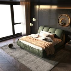 a large bed sitting on top of a wooden floor next to a wall mounted mirror