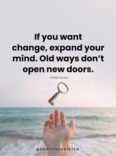 someone holding a key in their hand with the quote if you want change, expand your mind old ways don't open new doors