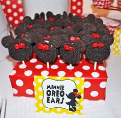 minnie mouse cupcakes are on top of a red box