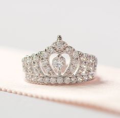 a princess's tiara is shown on top of a table