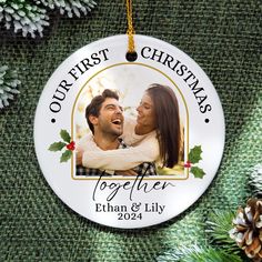 personalized christmas ornament with photo on it and pine cones in the background