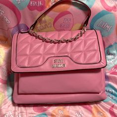 New Never Been Used Bubble Gum Pink Steve Madden Purse/Backpack. Can Be Converted To Be Either A Backpack Or A Purse. Has 3 Compartments Inside, One Compartment Has Two Pockets And Another Compartment Has A Zippered Pocket. Chic Pink Satchel For School, Chic Pink School Satchel, Trendy Pink Satchel For On-the-go, Pink Satchel With Detachable Strap, Backpack Style, Pink Satchel With Detachable Strap Backpack, Pink Square Satchel With Detachable Strap, Trendy School Satchel With Detachable Handle, Trendy Pink Satchel, Trendy Pink Satchel With Zipper Closure