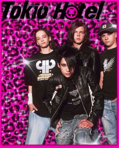 the band tokyo hotel posing in front of a leopard print background