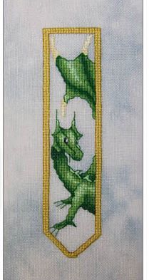 a cross - stitch bookmark with an image of a green dragon on it's side