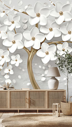 a living room with white flowers on the wall and a large tree in the background