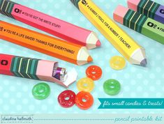 four pencils with different colored crayons and donuts on the bottom one