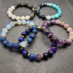 ♊ Using Tiger Eye, opal, druzy agate and amethyst, bring the duality of Gemini to life. Choose from 5 different styles of bracelet with two options to personalize then with a Gemini spacer. Mystical Bracelets With Natural Stones As Gifts, Mystical Natural Stone Bracelets As Gift, Fusion Style Beaded Bracelets With Gemstones, Mystical Adjustable Gemstone Beads Bracelets, Mystical Gemstone Bracelets As Gift, Adjustable Purple Agate Beaded Bracelets, Everyday Moonstone Gemstone Beads Bracelets, Everyday Moonstone Bracelets With Gemstone Beads, Fusion Style Beaded Bracelet Gift