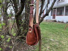 "Leather Pouch with Shoulder Strap | Leather Coin Pouch | Leather Drawstring Bags | Medieval Coin Pouch | Medicine Bag | Jewelry Bag | Handmade Victorian Handmade leather coin pouch with shoulder strap crafted for those who seek simplicity in their lives. This minimalistic pouch can fit perfectly in your pocket, backpack, purse, etc. The high quality soft leather from Wisconsin creates the most unique coin pouch as close as it can get from the ones crafted in ancient times. Use this unique pouch Unique Pouch, Leather Coin Pouch, Leather Drawstring Bags, Bag Jewelry, Medicine Bag, Jewelry Bag, Drawstring Bags, Bag Handmade, Coin Pouch