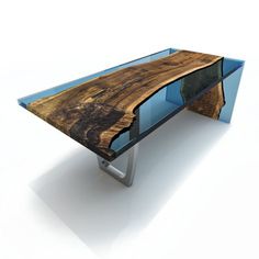 a table made out of wood and glass with a blue top is shown in front of a white background