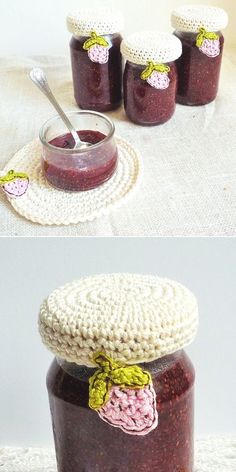 three jars filled with jam sitting on top of a white doily next to each other