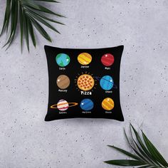 a square pillow with the solar system on it