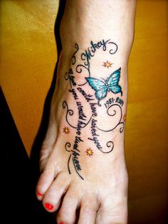 a woman's foot with a blue butterfly on it and the words mother written in cursive writing