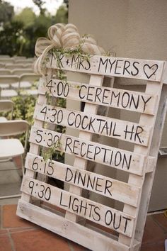 a wooden sign that says mr and mrs's ceremony, 350 cocktail hour reception, 35 dinner hours, 39 lights out