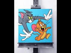 an image of a cartoon character on a blue background with the caption cat and mouse