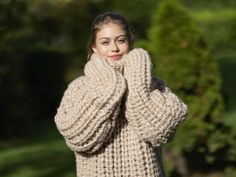 CUSTOM ORDER ITEM    MATERIAL  : 12 strands of Extrafine Merino Wool                          Extra quality yarn that doesn't shed like hairy yarn normally  does                              COLOUR : Beige ( There may be a slight difference because of the different monitors' representation)                            ♥   In the picture the model is wearing a garment with these measurements :  A: ( Body length) : 31.5 " / 80 cm B: ( Chest width) : 23.2 " / 59 cm C: (Sleeve from under the arm) : 2 Cozy Beige Knit Knitting Pattern, Cozy Beige Knitting Pattern, Hand Knitted Beige Knitting Pattern For Fall, Beige Hand Knitted Fall Knitting Pattern, Cozy Chunky Knit Merino Wool Pattern, Cozy Chunky Knit Merino Wool Knitting Pattern, Cozy Chunky Knit Pattern In Merino Wool, Cozy Hand Knitted Merino Wool Knitting Pattern, Fall Chunky Knit Beige Knitting Pattern