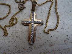 Religious antique French vermeil gold plated chain necklace with vermeil gold plated Christian cross crucifix with transparant stones. I bought the chain with cross on a brocante ( fleamarket ) ( Lille ) in France. Measures Chain: 16,8 inches ( 42 cm ) Measures cross crucifix ; 0,87 x 1,4 inches ( 2,24 x 3,57 cm ) If you don't have paypal you can pay by bank transfer. Registered shipping is possible. For other pictures or information do not hesitate to contact me. I deliver all over the world. Victorian Gold Crucifix Jewelry, Gold Crucifix Necklace For Wedding, Antique Gold Cross Pendant Necklace, Vintage Gold Cross Pendant Necklace, Victorian Gold Cross Pendant Jewelry, Antique Gold Cross Pendant Jewelry, Gold Pendant Cross Necklace For Wedding, Vintage Hallmarked Cross Necklace, Vintage Cross Necklace With Hallmark