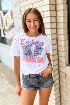 Ready to two-step? This Morgan-inspired crop top is totally fit for a country hoedown! Featuring a black-splatter pattern, plenty of distressing, and a raw-hemmed hemline - you'll be ready to rock 'n roll. 50% cotton, 50% polyester unisex fit crew neck Southern Roots Boutique112 W. Main St. Paragould, AR *Please allow 5-7 business days processing time for this item to be shipped/picked up. Fitted Acid Wash Distressed Top, Trendy Fitted Distressed T-shirt, Fitted White Top With Frayed Hem, White Fitted Top With Frayed Hem, Fitted White Distressed Tops, White Fitted Distressed Tops, White Distressed Fitted Tops, Trendy Acid Wash Top With Frayed Hem, Spring Short Sleeve Tops With Paint Splatter