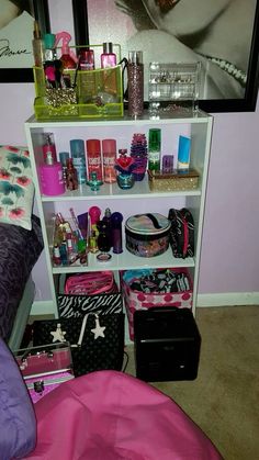 a white shelf filled with lots of cosmetics and personal care items