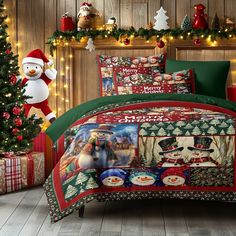 a christmas themed bed set with snowmen and presents