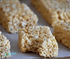 several pieces of rice krispy treats on a tray