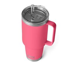 a pink coffee cup with a lid and handle is shown in front of a white background