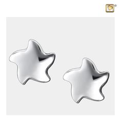 Wear your Love™ with LoveUrns Treasure Angelic Star Earrings. Composed of Sterling Silver with Rhodium plating, these earrings display beautiful stars, symbolizing your loved one's journey to the heavens. It is a classic piece of jewelry and is the perfect tribute for your loved one. Dimensions 0.43 H mm These earrings do not hold ashes. Earrings Display, Sterling Silver Stud Earrings, Matching Jewelry, Cremation Jewelry, The Heavens, Earring Display, A Prayer, Silver Stud Earrings, Dream Jewelry