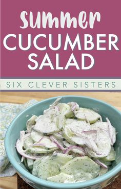 a blue bowl filled with cucumber salad on top of a wooden cutting board