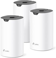 three white air purificates sitting next to each other