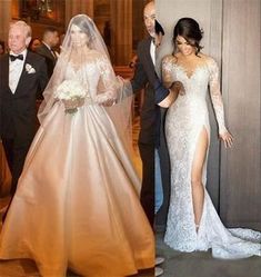 the bride and groom are getting ready to walk down the aisle in their wedding dresses