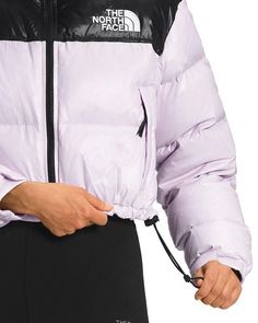 Attached, stowable, three-piece hood packs into stand collar.Long sleeves, encased-elastic cuffs with adjustable hook-and-loop cuff tabs.Two-way front zip closure.Shiny ripstop fabric for durability, water-repellent, oversized baffles, logo on left chest and back-right shoulder.Secure-zip hand pockets.Hem cinch-cord for adjustability.Lined.Imported.Web ID: 4294108.Shell & lining: 100% recycled nylon; filling: 85% down/15% waterfowl feathers.Machine wash North Face Nuptse, Ripstop Fabric, Women's Jackets, Body Heat, Under The Stars, Cropped Jacket, North Face Women, Women's Coats, Jackets Online