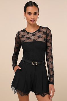 A date night spent in the Lulus Sheer-ly Sweet Black Sheer Lace Crew Neck Long Sleeve Bodysuit is bound to be a total treat! Sheer floral lace shapes this flirty bodysuit with a crew neckline and sheer dÃ©colletage that flows into long fitted sleeves. The figure-hugging bodice finishes at attached thong bottoms with snap closures. Fit: This garment fits true to size. Length: Size medium measures 29.50" from shoulder to hem. Bust: Great for any cup size. Waist: Fitted - stretchy fabric allows cus Fitted Bodysuit With Lace Closure For Night Out, Summer Lace Bodysuit For Night Out, Fitted Flirty Lace Top, Lace Bodysuit For Party, Fitted Lace Flirty Top, Fitted Lace Top Bodysuit For Party, Long Sleeve Lace Bodysuit For Party, Party Lace Bodysuit With Lace Trim, Spring Lace Bodysuit For Night Out