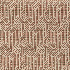 an orange and white pattern on fabric with small squares in the center, as well as lines