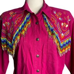 Vintage 90s Embroidered Beaded Western Shirt M Pink Buttons Pockets Long Sleeves Brand: KZK Made in China Size M 65% Polyester, 35% Cotton  Measurements: Chest: 22" underarm to underarm Sleeve length: 21" Length: 27" from shoulder to hem Pre-owned No defects noted Fall Multicolor Embellished Tops, Casual Long Sleeve Beaded Top, Casual Beaded Long Sleeve Top, Festival Long Sleeve Sequin Tops, Fitted Multicolor Beaded Tops, Pink Embellished Bohemian Top, Long Sleeve Sequin Tops For Festivals, Sequined Long Sleeve Tops For Festivals, Sequin Long Sleeve Festival Tops