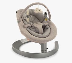 a baby swing with an animal on the back and seat attached to it's base