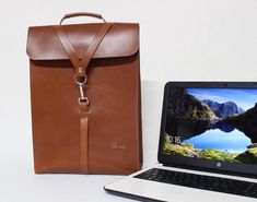 Men's leather laptop backpack, this business travel bag is a brown leather bag good for going to office or work trip.  The leather laptop bag has ample main space to protect your laptop and organize men's accessories in your own way. Personalized leather laptop backpack purse ideal leather backpack purse de MacBook Air and MacBook Pro ( You can contact me to customize the sizes ). Dimensions:  15,8 inches tall (40 cm) 11,8 inches wide (30 cm) 4 inches deep (10 cm) For you don't overload your day Brown Business Laptop Bag Backpack, Brown Business Laptop Backpack, Brown Laptop Bag For Business, Brown Backpack Laptop Bag For Business Trips, Business Laptop Backpack In Brown, Brown Laptop Backpack For Business Trips, Brown Laptop Backpack For Business, Business Brown Laptop Backpack, Leather-backed Laptop Backpack For Office