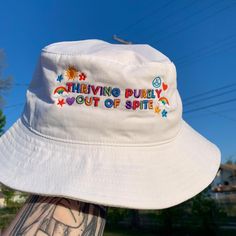 This colorful embroidered bucket hat adds a bit of fun to any outfit. The kidcore aesthetic and rainbow color palette adds to the playful nostalgia. Whether your favorite new  accessory, your go-to on bad hair days, or as a gift to a friend who loves dopamine dressing, this hat is sure to add a bit of joy to any outfit! ✰ ABOUT OUR PRODUCTS✰ Our products are comfy and made to order with unique and trendy designs. ✰ S H I P P I N G & P R O C E S S I N G ✰ This product is made especially for you as soon as you place an order, which is why it takes us a bit longer to ship it to you. Making products on demand instead of in bulk helps reduce overproduction, so thank you for making thoughtful purchasing decisions! Please allow 2-5 business days for your order to be processed before it ships. Onc Bucket Hat Aesthetic, Funny Bucket Hats, Kidcore Clothing, Trendy Hats, Cute Bucket Hat, Hat Y2k, Bob Chapeau, Indie Clothing, Hat Aesthetic