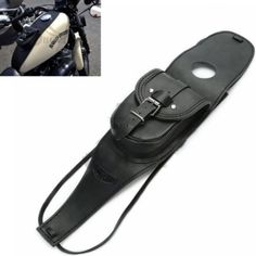 a motorcycle with a black leather bag on it's back and an image of a motorbike in the background