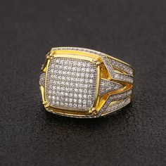 Drop the best, shine your best! The stones we use in this Square Paved Diamond Ring is AAA cubic zirconia stones that reflect with different accents to any type of light, at any time of the day. DETAILS Material: Copper + 14K Real Gold/White Gold Plating Finish: 5 times gold plating Stone Type: 5A Cubic Zirconia Size: 7/8/9/10 Grab your iced-out jewelry at prices that won't break the bank! Our pieces are very durable and timeless. They are guaranteed one-year free warranty. Want to make your pla Gold Iced Out Diamond Ring As A Gift, Gold Iced Out Diamond Ring Gift, Gold Diamond Ring With Iced Out Detail, Gold Iced Out Diamond Ring, Iced Out Gold Diamond Ring, Elegant Gold Iced Out Diamond Ring, Elegant Gold Iced Out Ring, Diamond White Rhinestones Promise Ring, Yellow Gold Diamond Ring With Sparkle