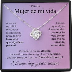 a necklace in a box with an inscription on the front and back saying,'la muer de mi viada '