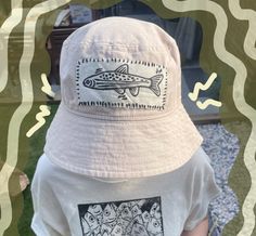 A unisex bucket hat with a handprinted lino patch sewn on. Cotton Hats With Graphic Print For Summer, Summer Cotton Hats With Graphic Print, Cotton Summer Hat With Graphic Print, Bucket Hats, Linocut, Caps Hats, Bucket Hat, Accessories Hats, United Kingdom