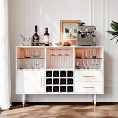 a white cabinet filled with wine glasses and bottles